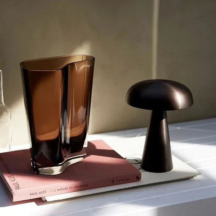 Portable wireless table lamp with dimmable LED, perfect for indoor/outdoor ambient mood lighting.