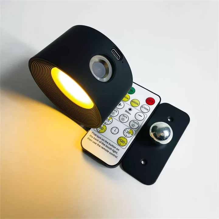 Wireless LED wall light, stick-on, black and white, cordless, for indoor and outdoor use, emits warm white glow, energy-effic