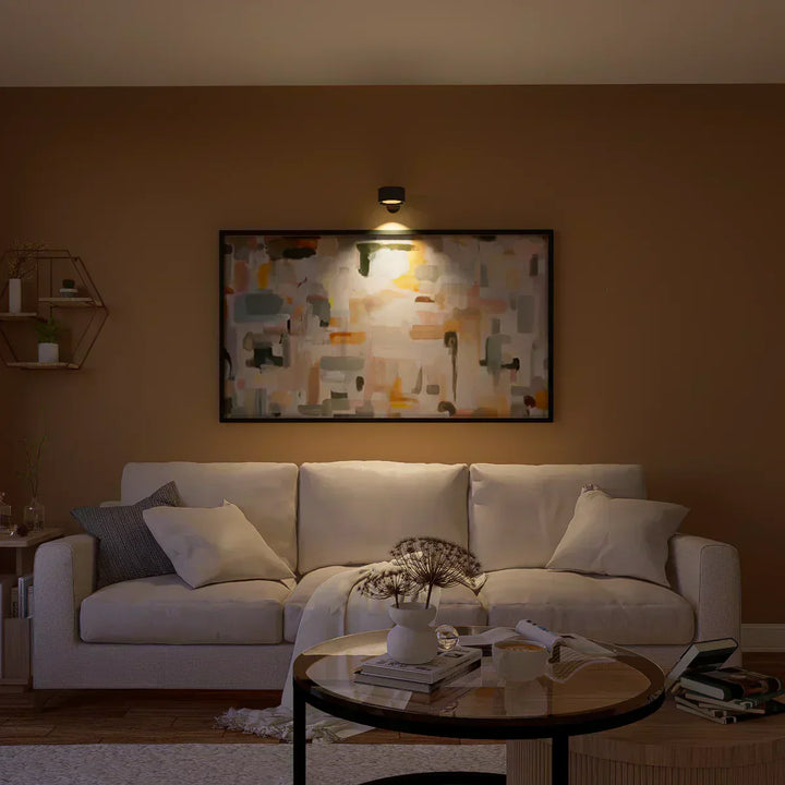 Wireless LED wall light, stick-on, black and white, cordless, for indoor and outdoor use, emits warm white glow, energy-effic
