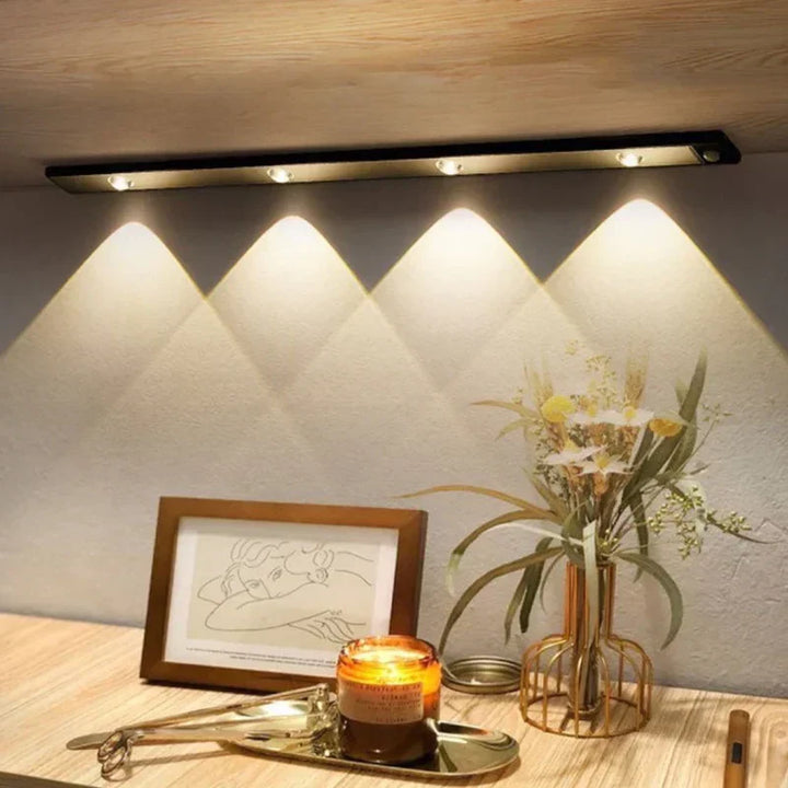 Bright LED closet light with motion sensor. Wireless, rechargeable under cabinet lighting for modern kitchens.