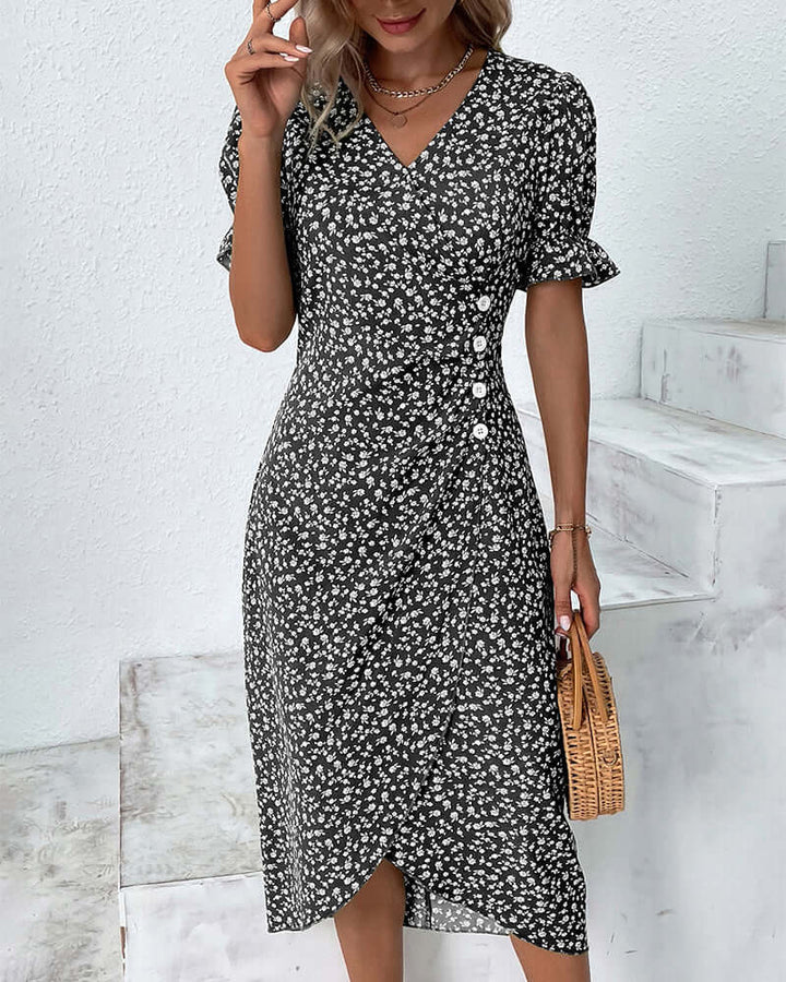 "Woman wearing elegant button-front dress in assorted colors with a flattering silhouette and classic style."