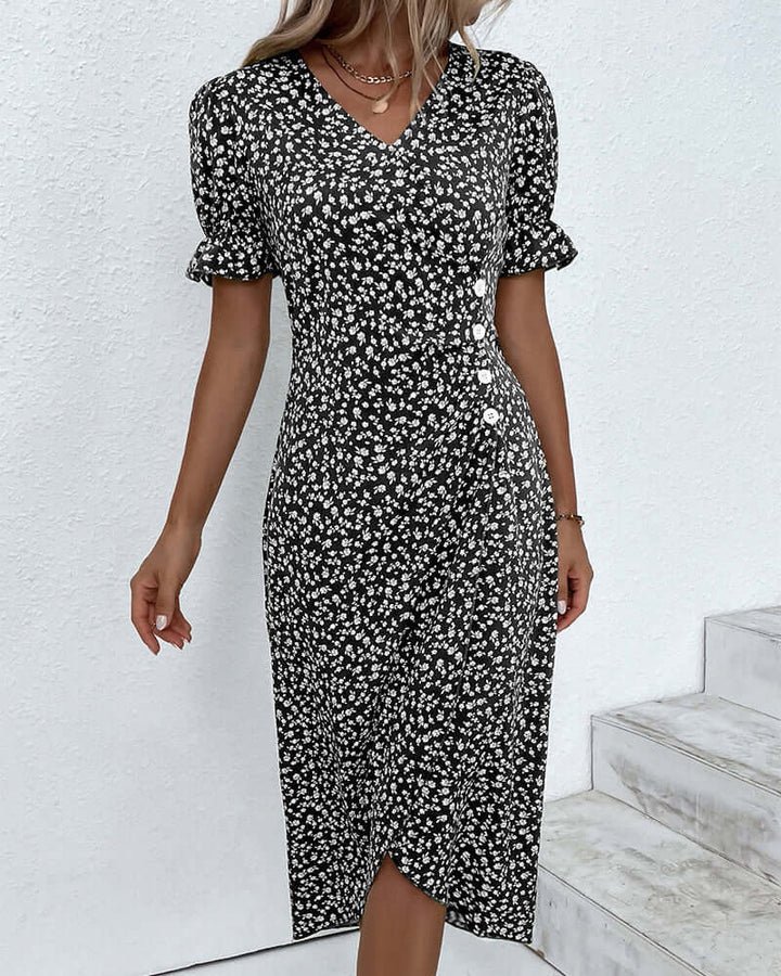 "Woman wearing elegant button-front dress in assorted colors with a flattering silhouette and classic style."