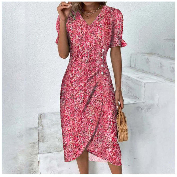 "Woman wearing elegant button-front dress in assorted colors with a flattering silhouette and classic style."