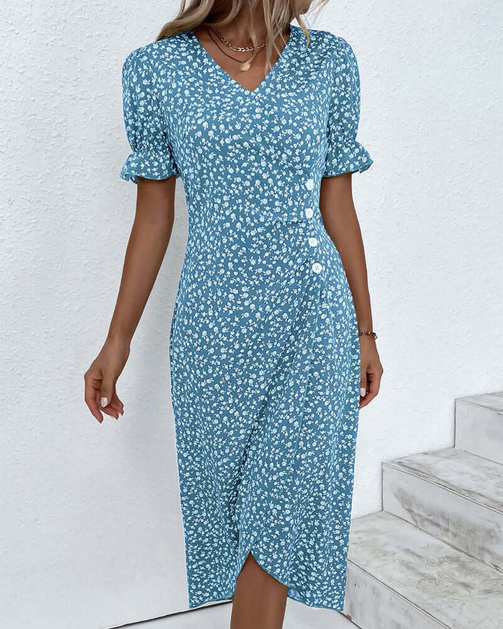 "Woman wearing elegant button-front dress in assorted colors with a flattering silhouette and classic style."