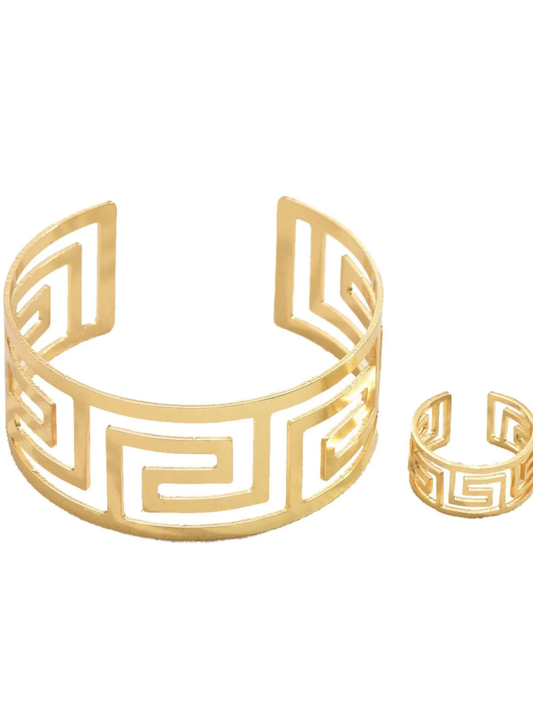 Close-up of women's 18K gold-plated geometric bracelet & statement ring set. Modern, elegant jewelry.