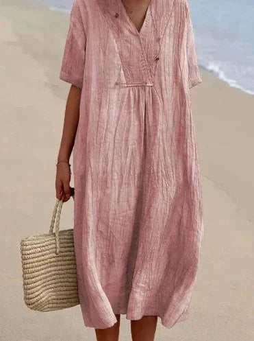Women's casual A-line summer dress, a comfortable cotton linen V-neck with pockets, perfect for beach days or holidays.