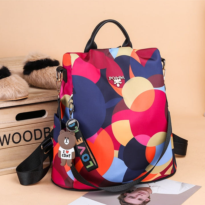 Black PU leather women's anti-theft backpack, water-resistant & durable for everyday security.