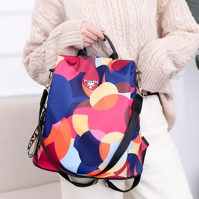 Keep valuables safe with this water-resistant anti-theft women's backpack, secure & organized for travel.