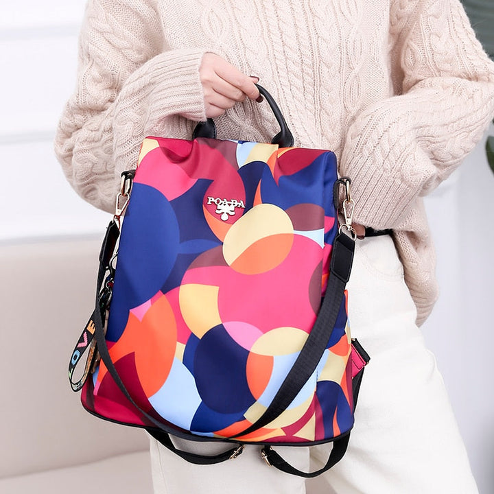 Keep valuables safe with this water-resistant anti-theft women's backpack, secure & organized for travel.
