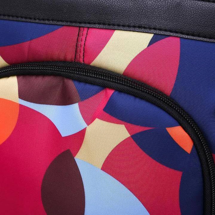Interior: organized compartments in a women's anti-theft backpack, fits laptop & daily essentials.
