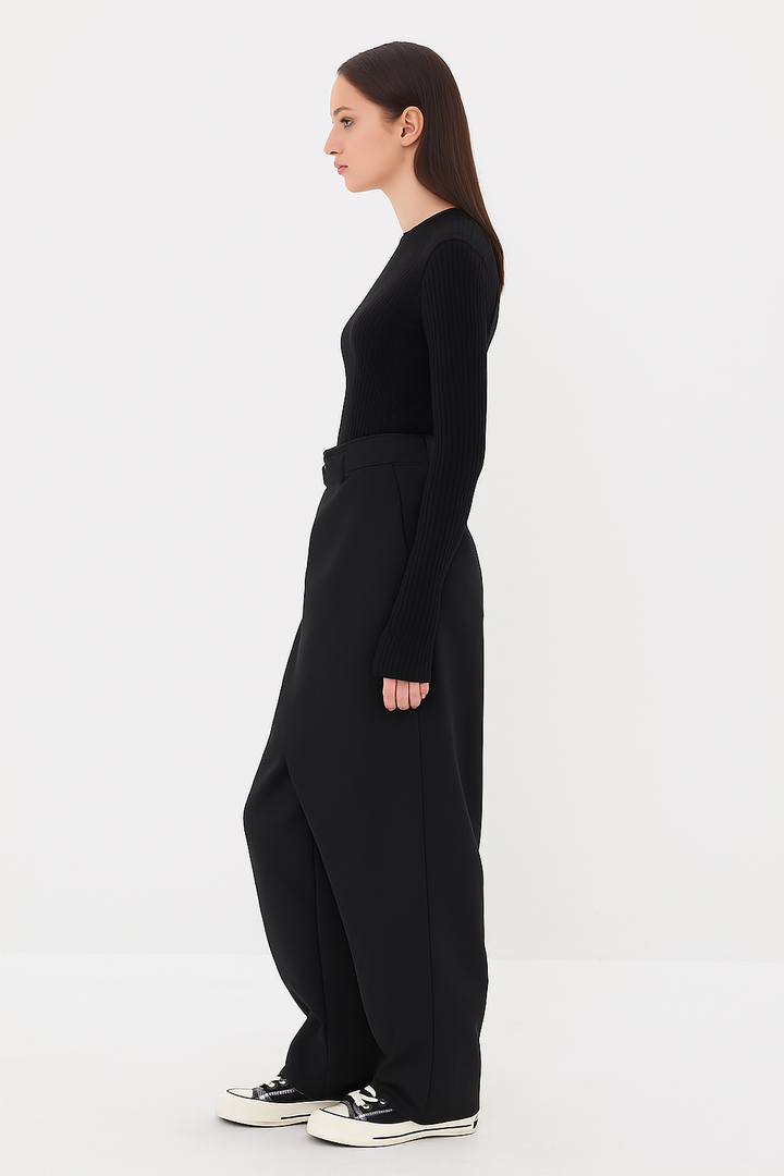 Sculptural women's asymmetrical pants, ideal for modern workwear or sophisticated casual outfits.