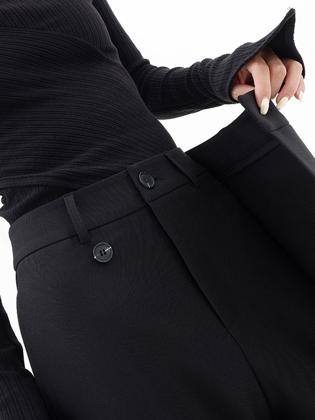 Fashion-forward women's asymmetrical pants, relaxed fit for a contemporary, chic style.