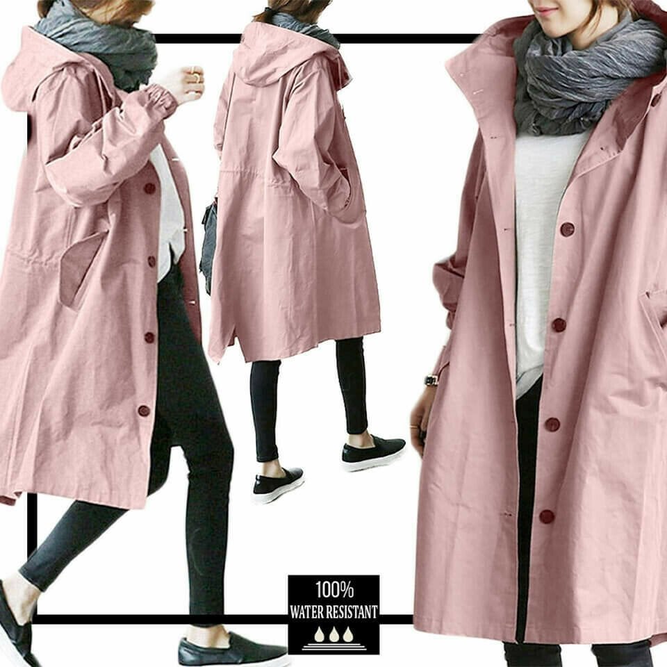 Women's Aurora lightweight windbreaker with hood, perfect for weather protection & travel.