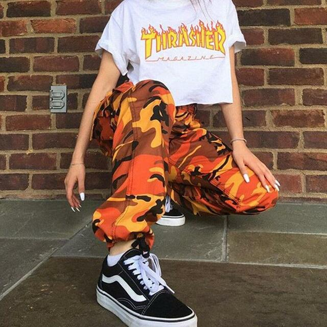 Women's baggy fit camo cargo pants with elastic ankle cuffs, perfect for casual streetwear style.