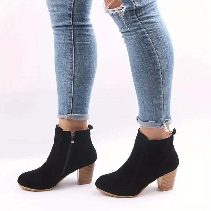 Comfortable women's block heel ankle boots, essential fall/winter footwear with practical side zip.