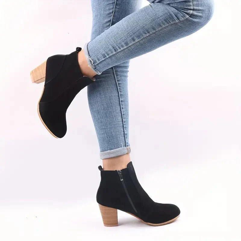 Chic women's ankle boots: block heel, side zip. Fashion-forward and great for everyday casual or dressy looks.