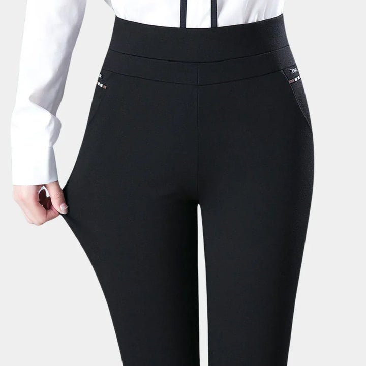 Comfortable women's high-waisted stretch pants in black, designed for a flattering fit and all-day wear.