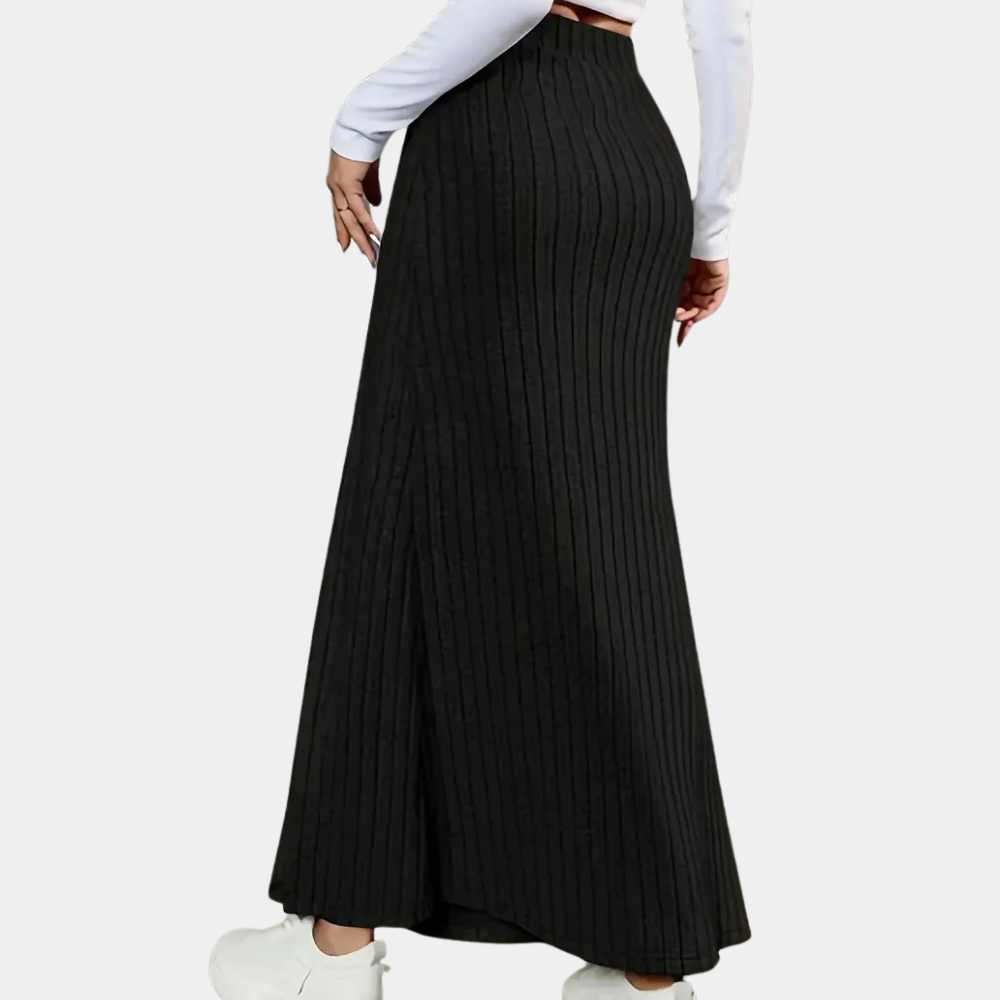 Elegant women's grey maxi skirt, long and fitted, featuring a stylish side slit and decorative button detail.