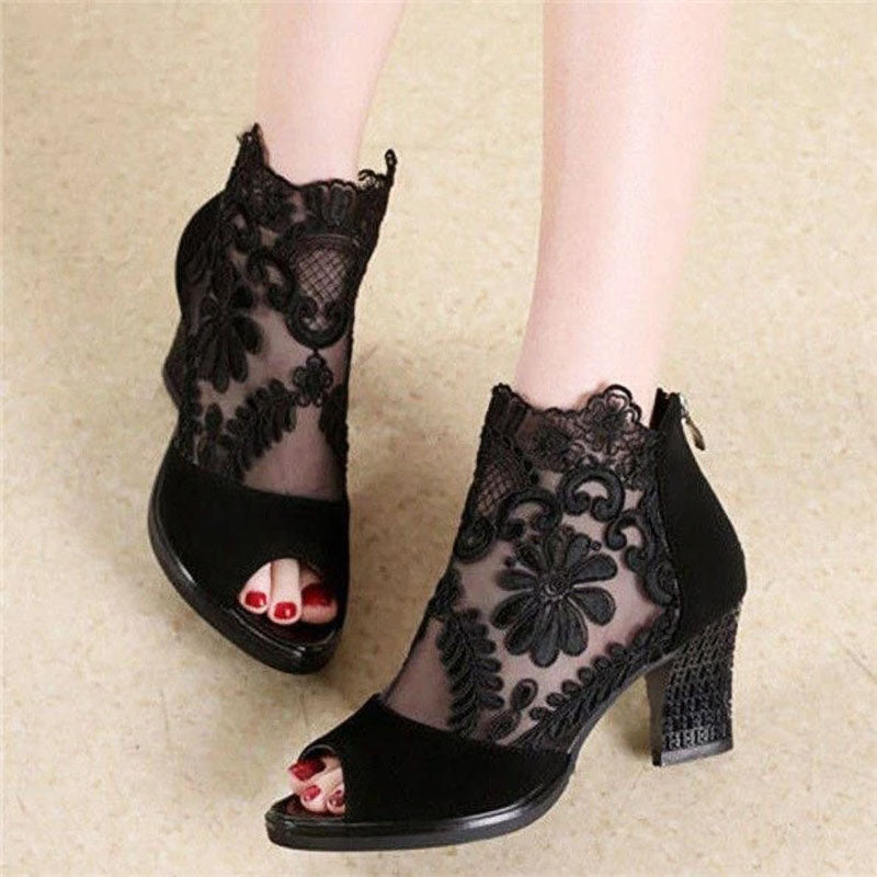 Women's black peep toe ankle strap heels with delicate floral mesh, perfect for elegant evening events & parties.