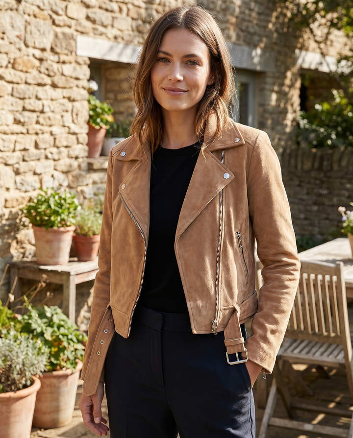 Stylish women's zip-up biker jacket, perfect slim-fit outerwear for a modern fashion look.