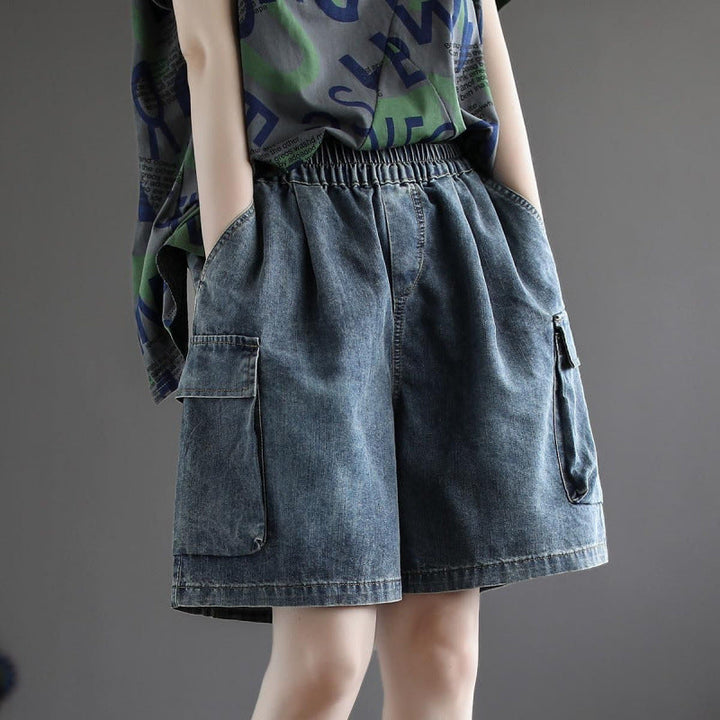 Women's blue baggy cargo jorts with wide leg fit for comfortable, trendy summer casual wear.