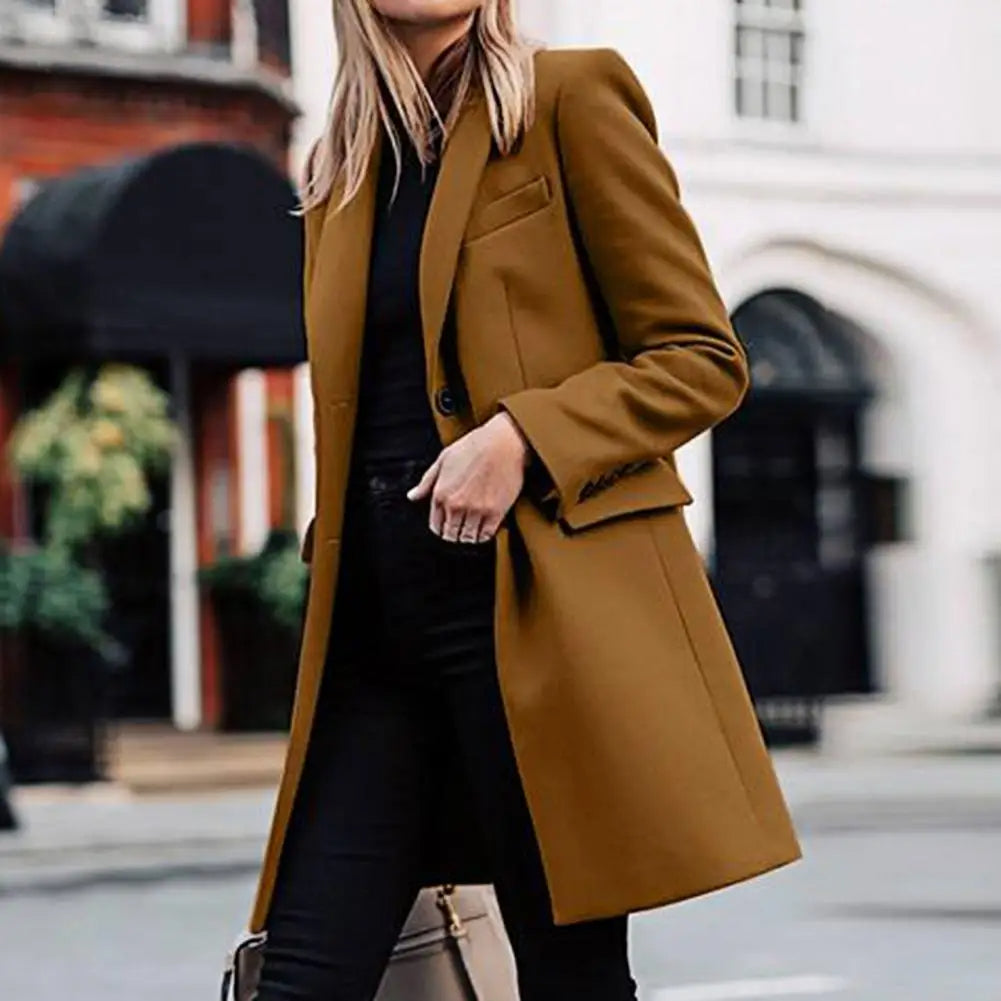 Stylish women's knee-length bohemian trench coat, an elegant and cozy outerwear piece for cold weather.
