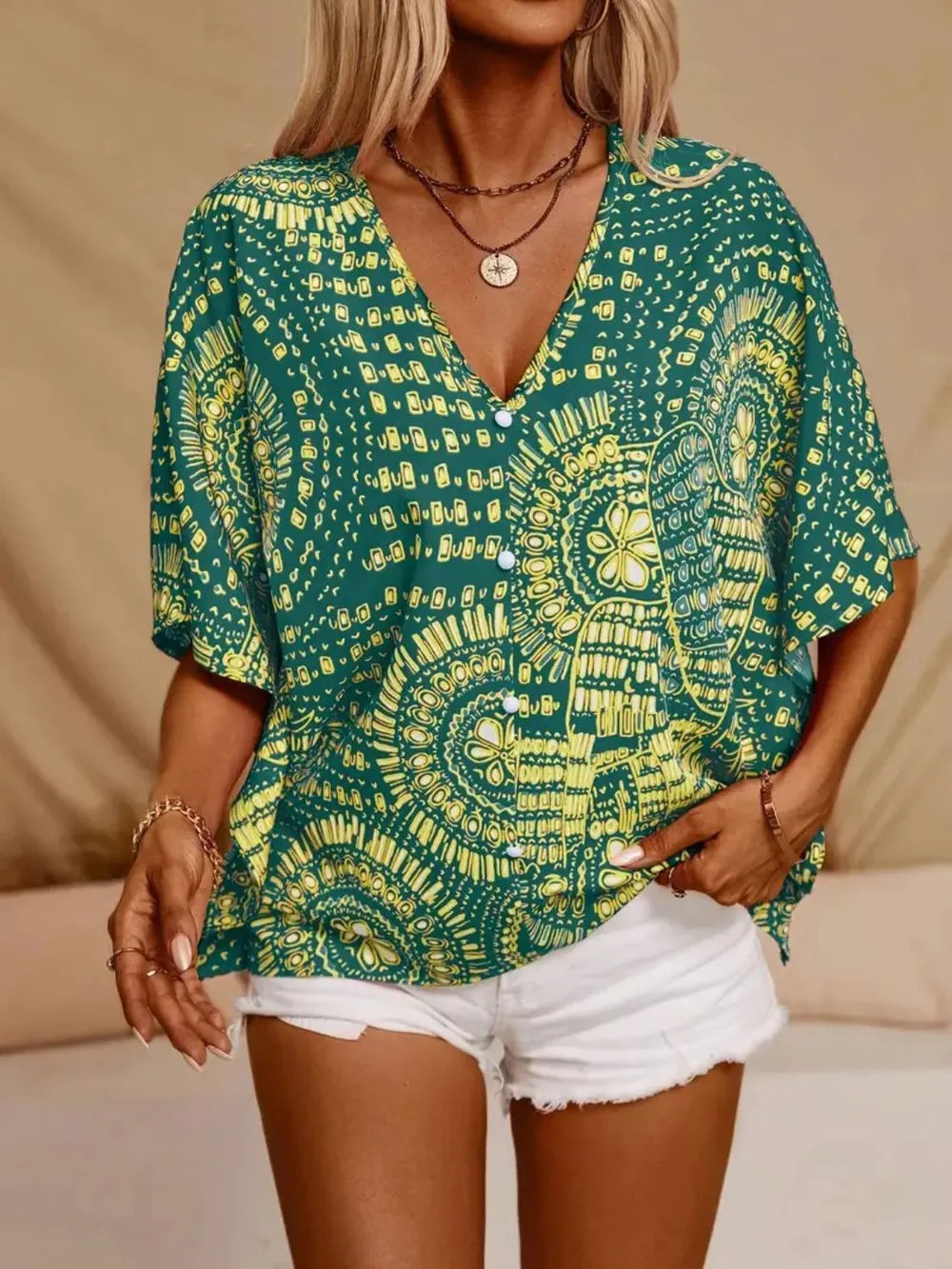 Comfortable women's flowy V-neck blouse, eye-catching bohemian print.
