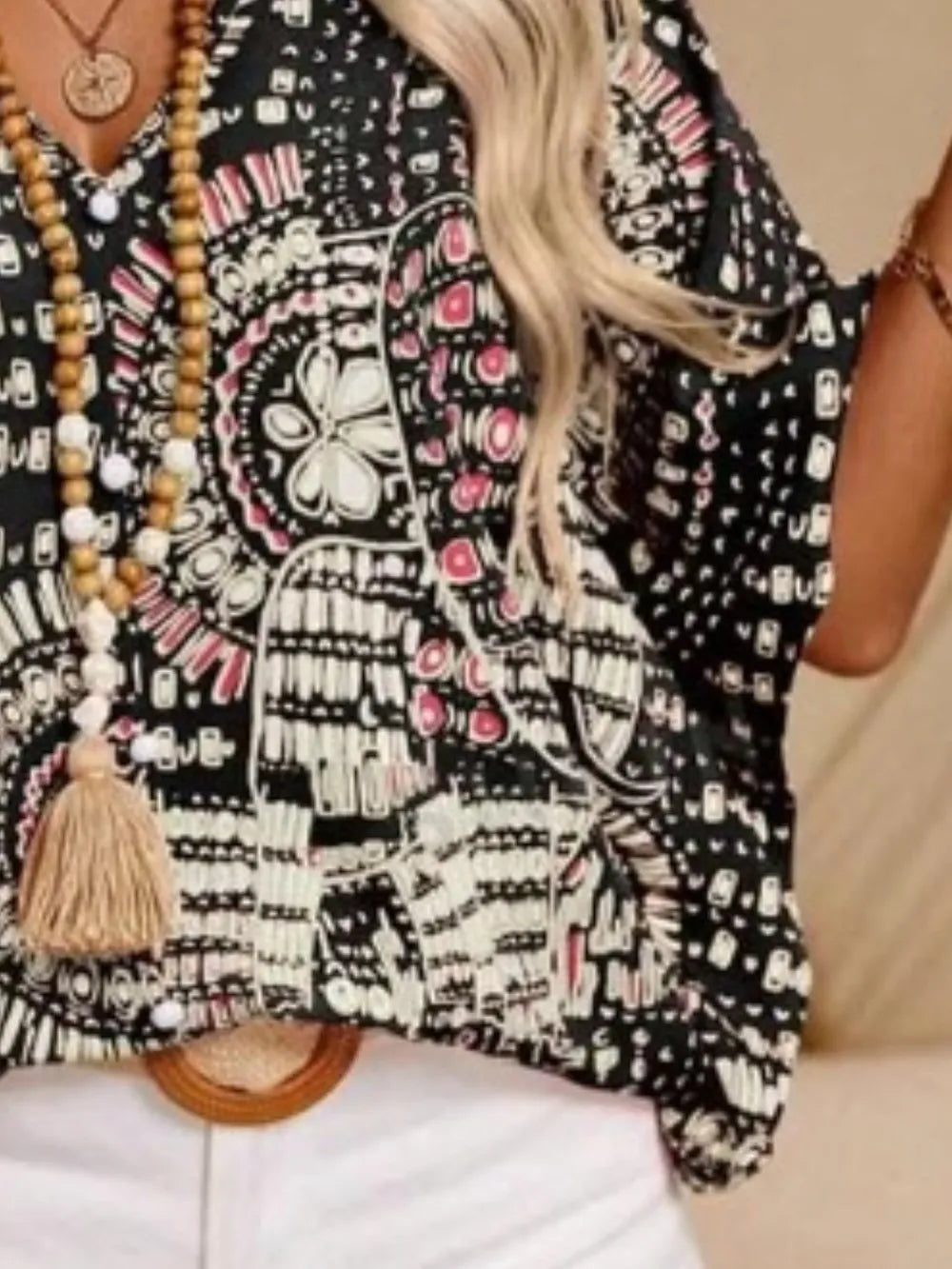 Women's bohemian print V-neck shirt, relaxed and chic for casual summer days.