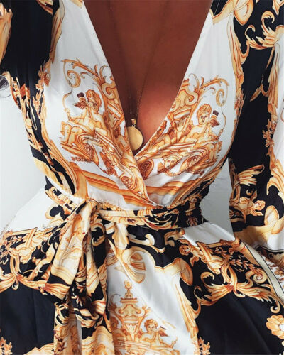 Front view of women's boho wrap summer maxi dress with long sleeves & inviting leg slit.