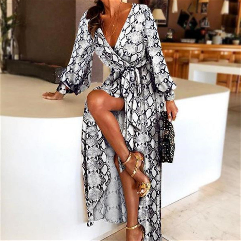 Trendy women's boho long sleeve wrap dress with a chic slit. Essential summer fashion & vacation wear.