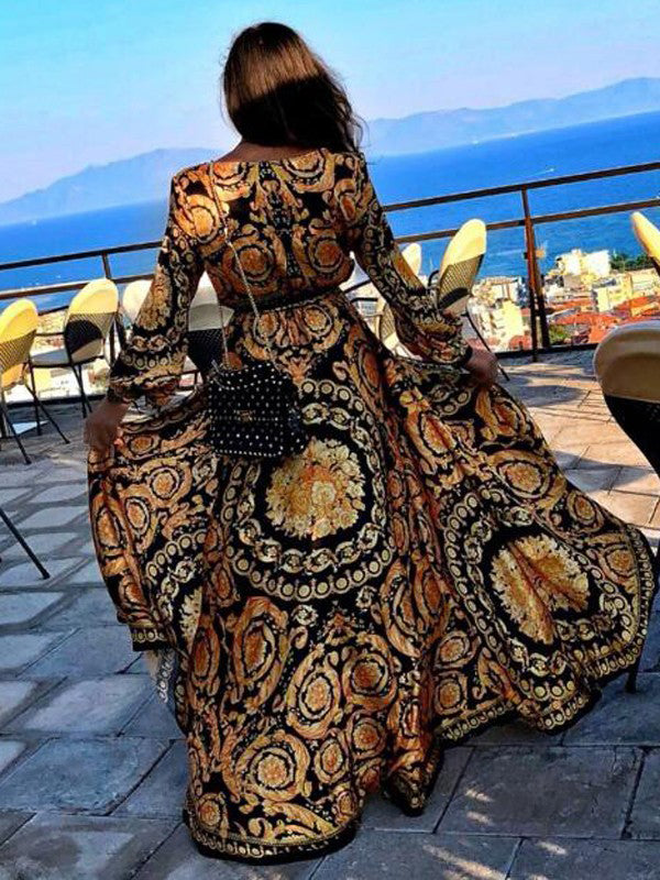Blue women's boho wrap summer dress with long sleeves & leg slit. Stylish for resort & casual wear.
