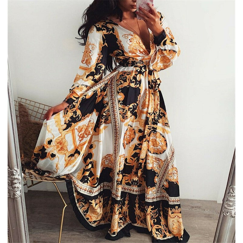 Elegant women's flowy boho wrap dress with long sleeves & graceful slit. Ideal for warm weather.