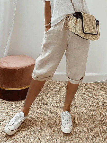Flexible fit women's breathable knee-length capris. Soft fabric drawstring pants for ultimate summer comfort.