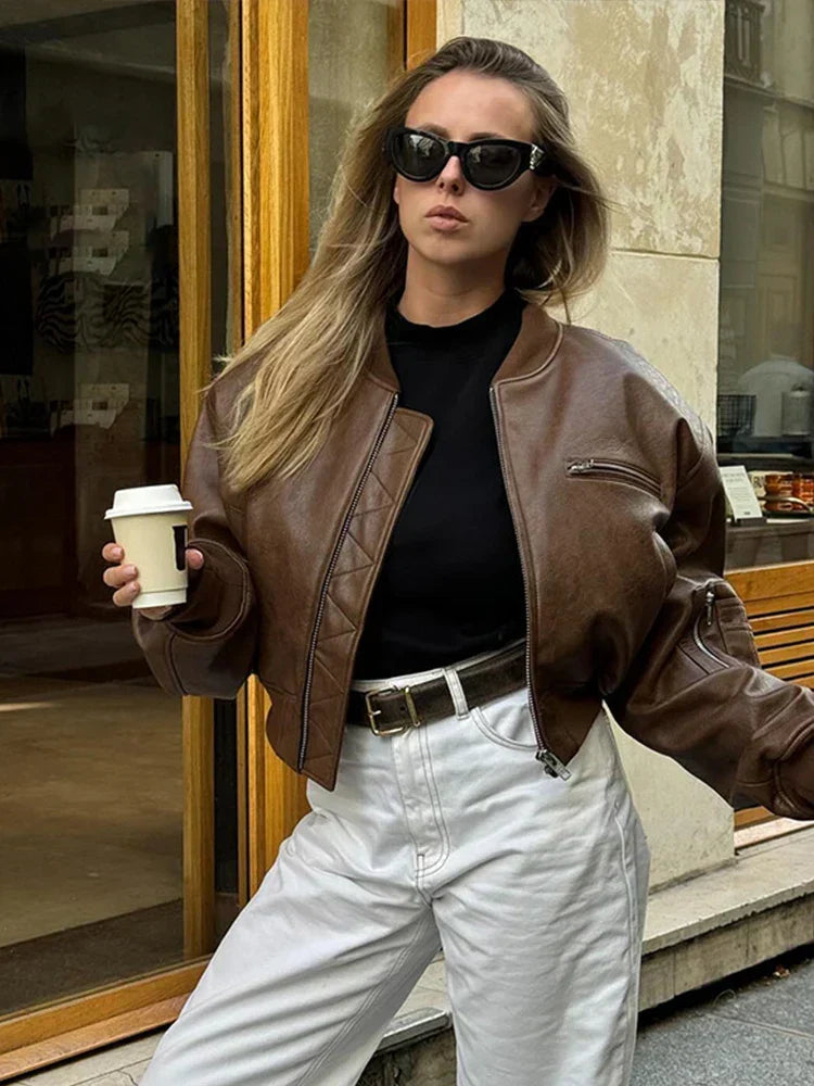 Versatile women's brown cropped bomber jacket, ideal vintage layering piece for street fashion.