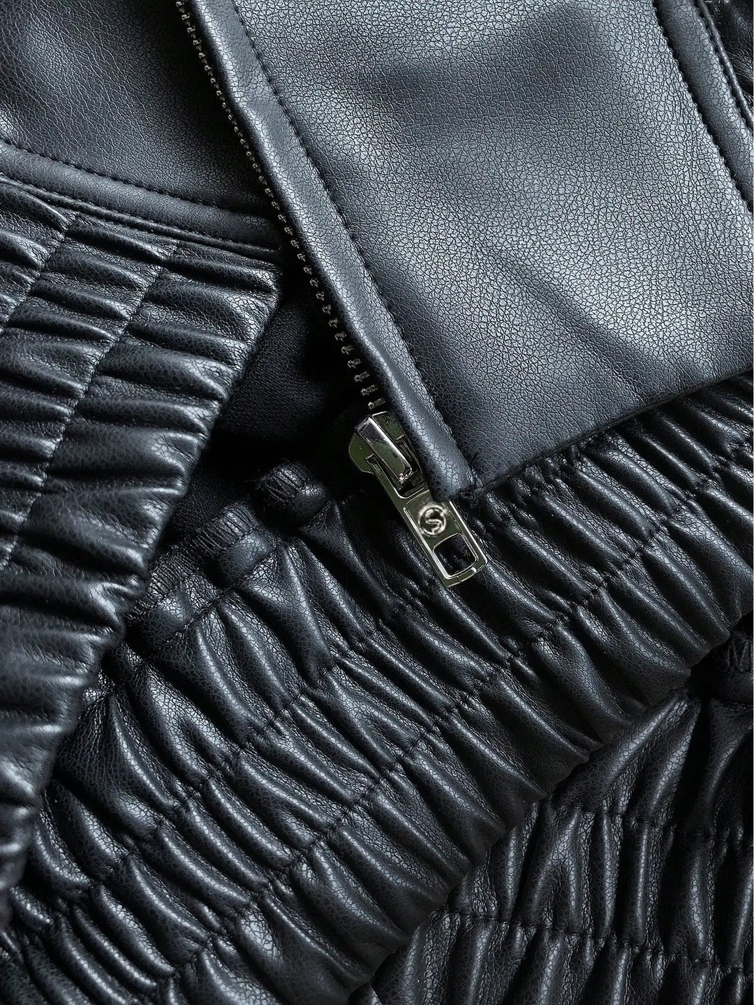 Everyday women's black faux leather jacket, a versatile casual outerwear for fall and winter fashion.