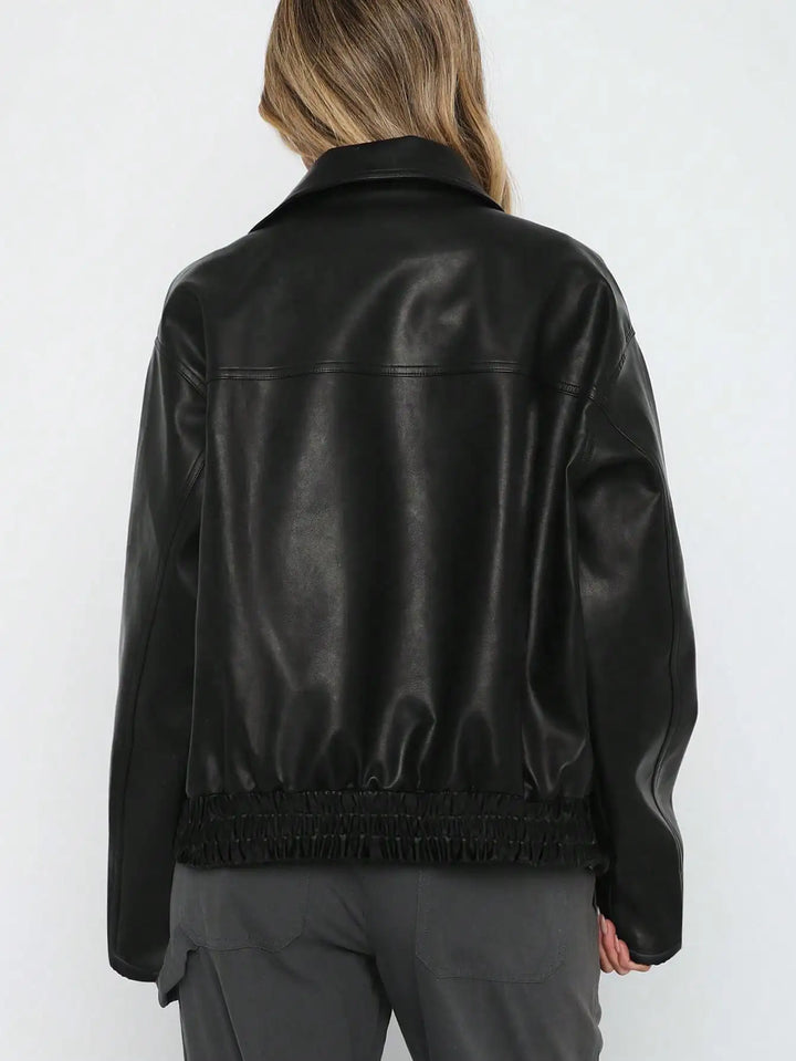 A classic black faux leather jacket for women, offering casual style and warmth for fall & winter.