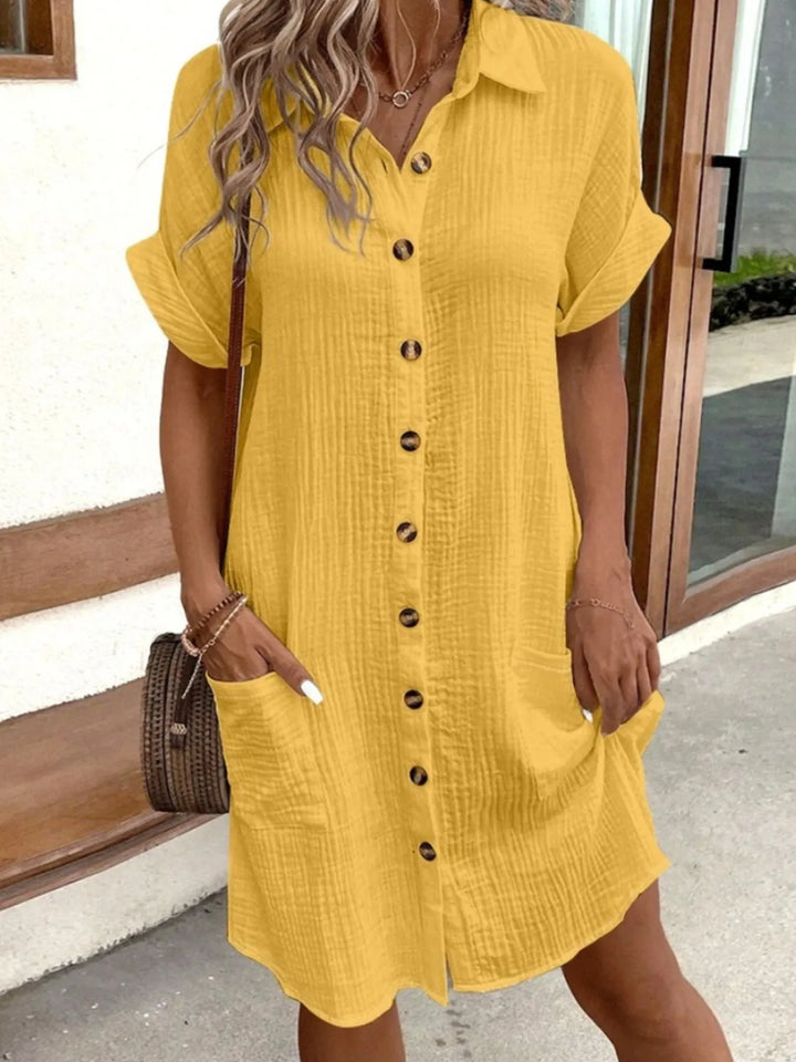 Summer casual women's mini dress, a comfortable button-down design with handy pockets.