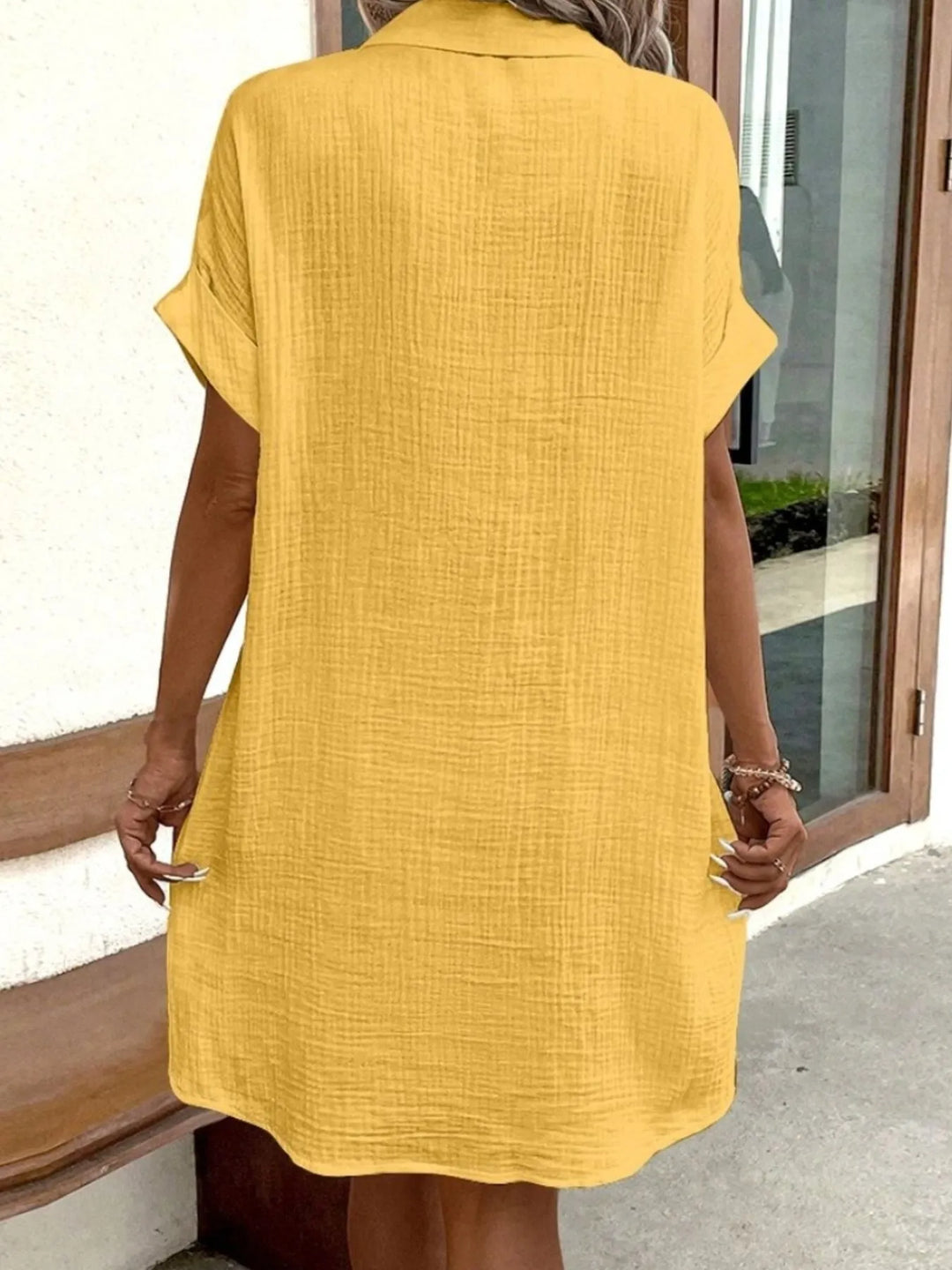 Chic women's button-down mini dress, everyday wear, relaxed fit, and essential pockets.