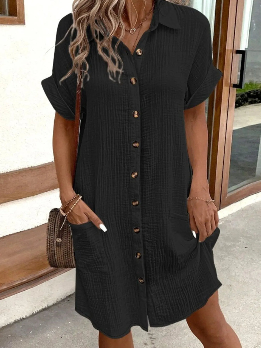 Summer style women's day dress, button-down front, short sleeves, and handy pockets.