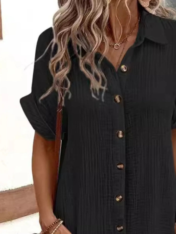 Versatile women's mini shirt dress, casual button-down style with essential pockets.