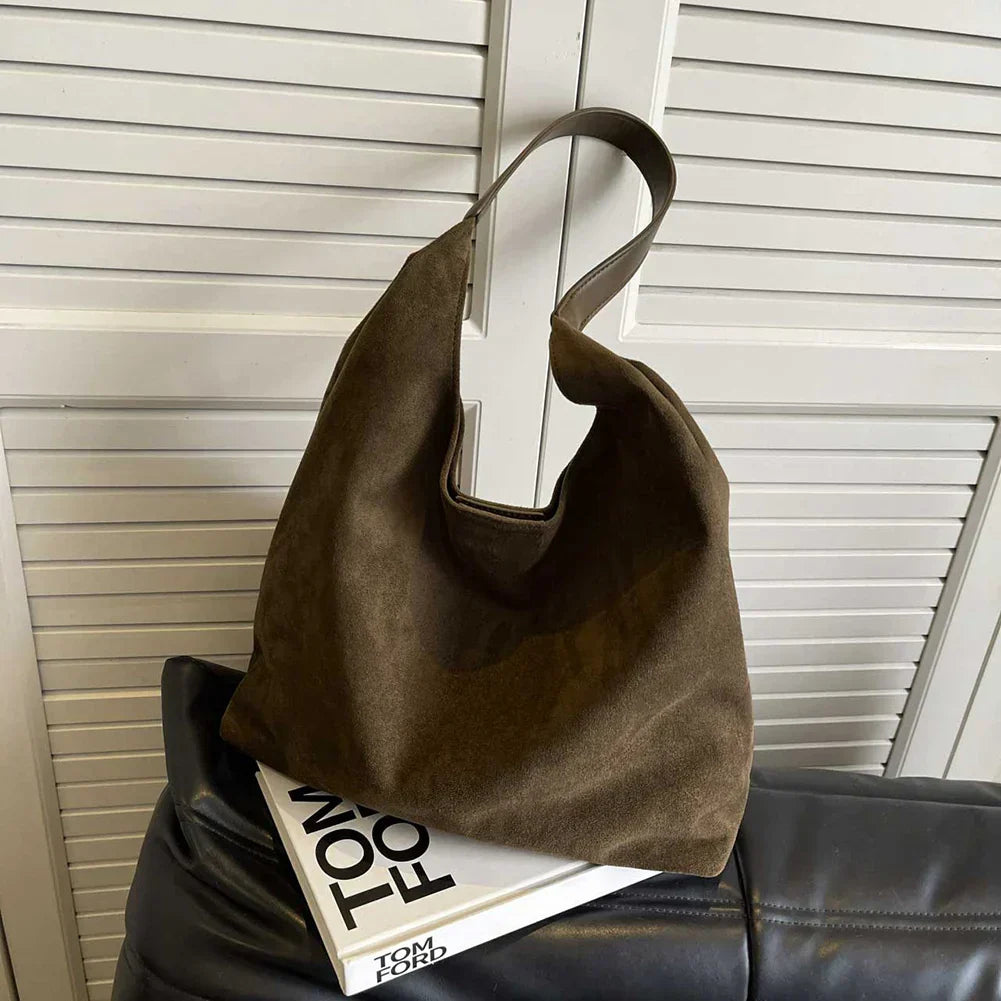 Versatile women's shoulder tote for travel, work, or daily errands. A fashionable & spacious casual bag.