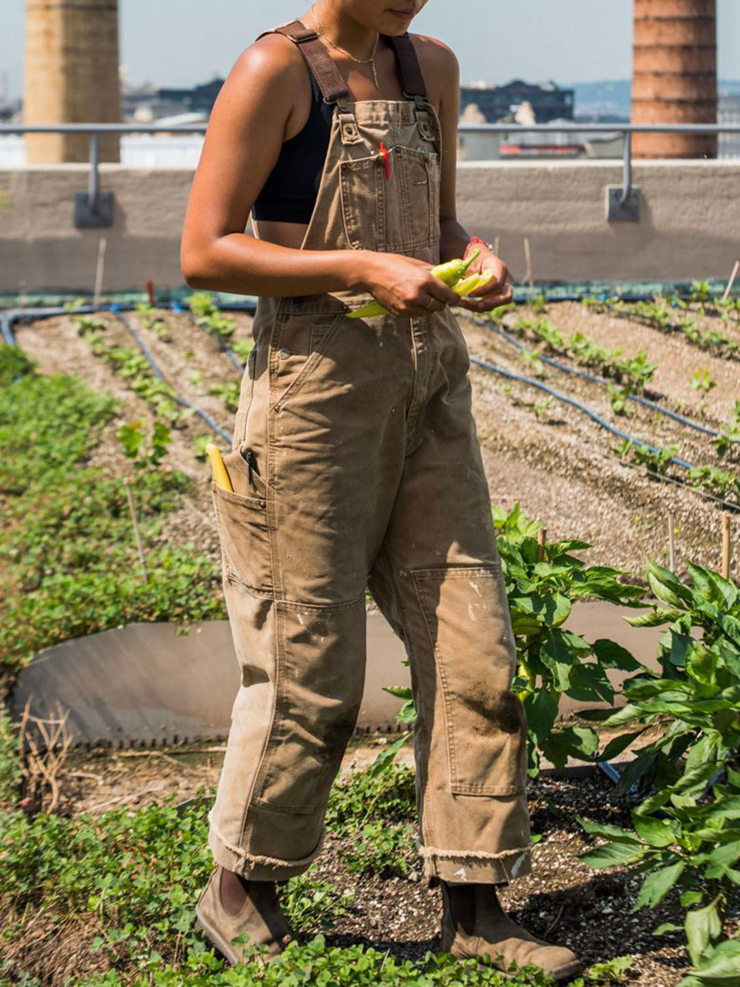 Women's casual utility dungaree jumpsuit in a relaxed fit, perfect for comfortable everyday style.
