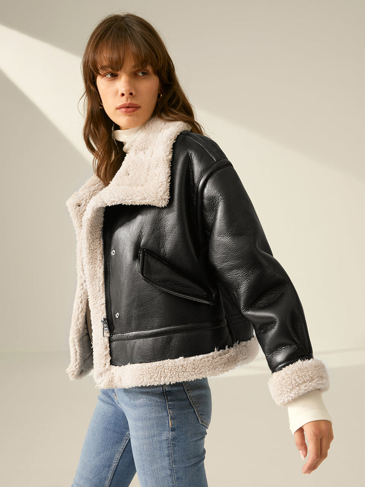 Chic women's aviator jacket. Warm winter outerwear designed for modern style & comfort.