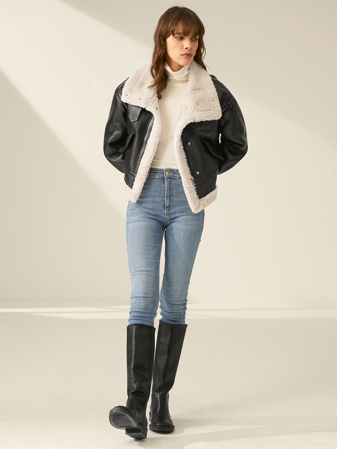 Trendy women's aviator jacket, offering stylish warmth as winter outerwear. Casual fashion.