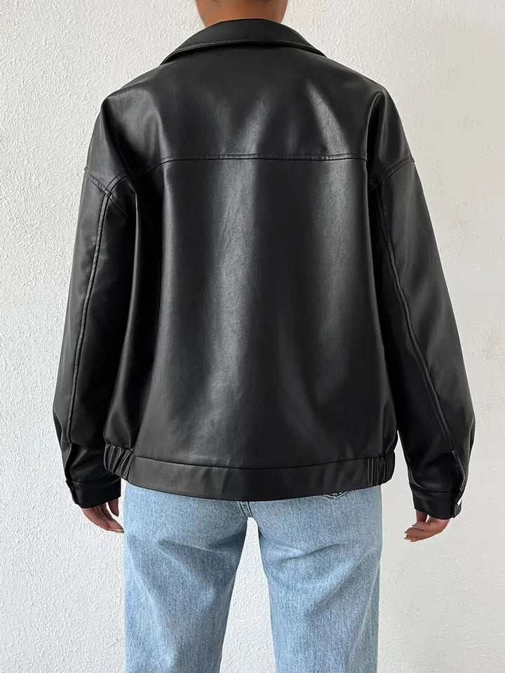 Black moto jacket with zip-front for women. Trendy outerwear, ideal for casual chic looks & an edgy fashion statement.