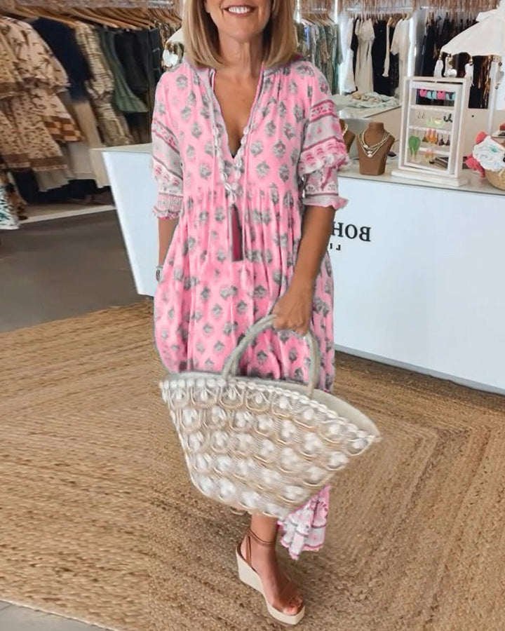 Versatile women's flowy floral V-neck dress, comfortable for any summer event.