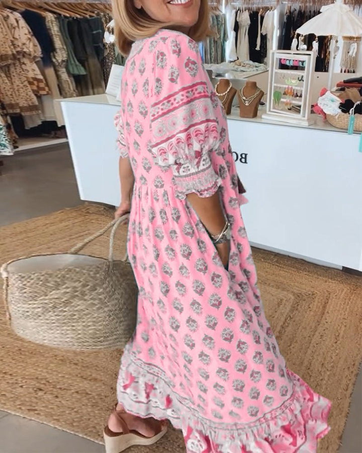 Casual women's floral V-neck midi dress, comfortable and chic for spring fashion.