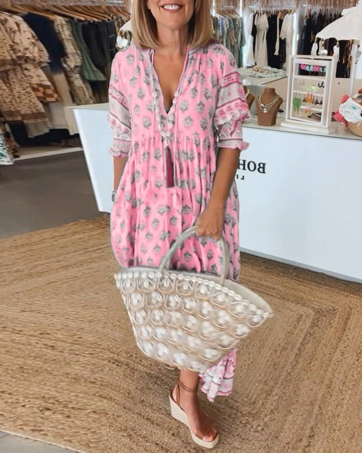 Flowy floral V-neck dress for women, a versatile choice for spring and summer fashion.