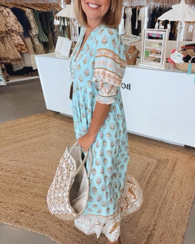 Versatile floral V-neck flowy dress, women's spring fashion essential.