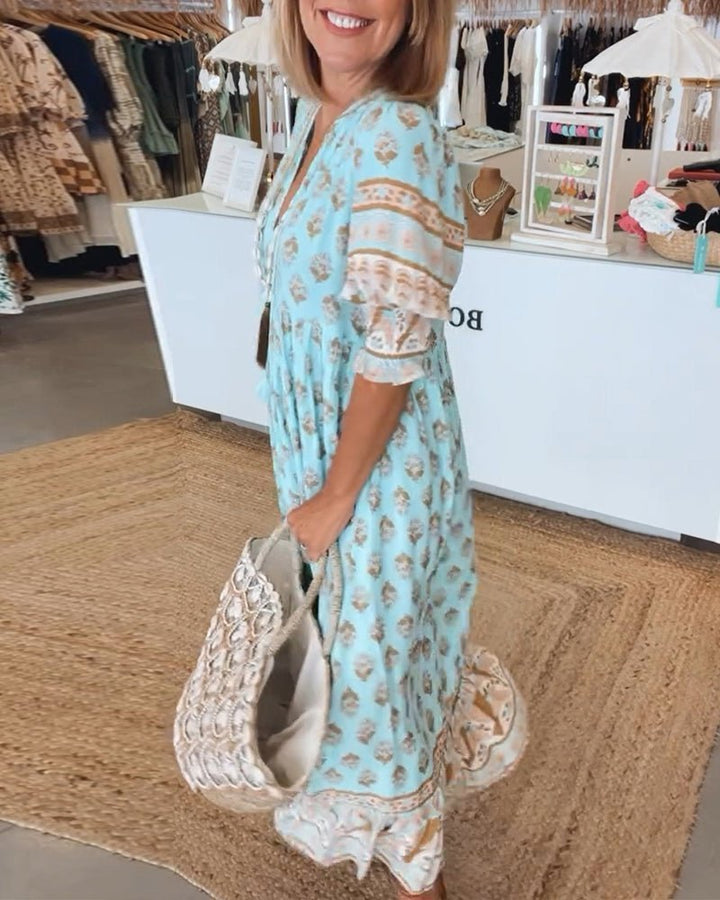 Versatile floral V-neck flowy dress, women's spring fashion essential.